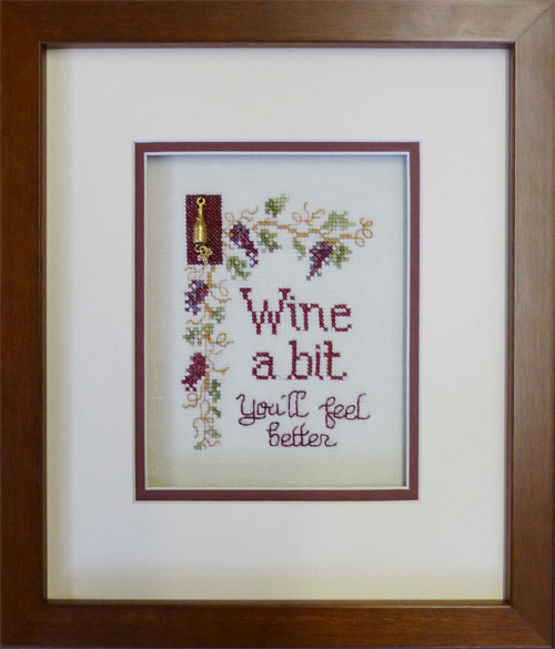 Wine a Bit Counted Cross Stitch framed at Hot Springs Frame & Art Supply